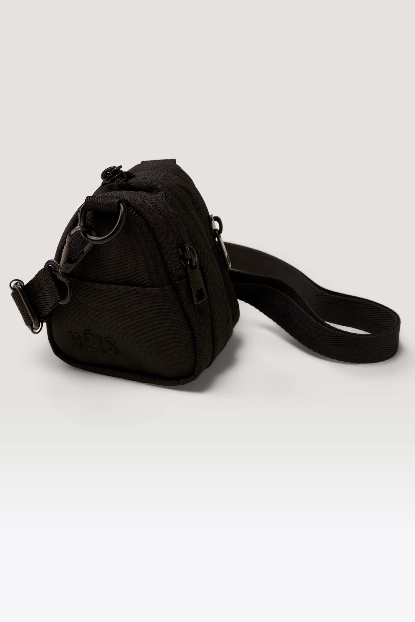 The Expandable Crossbody Charm in Black