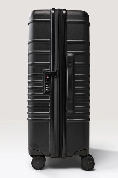 The Medium Check-In Roller in Black